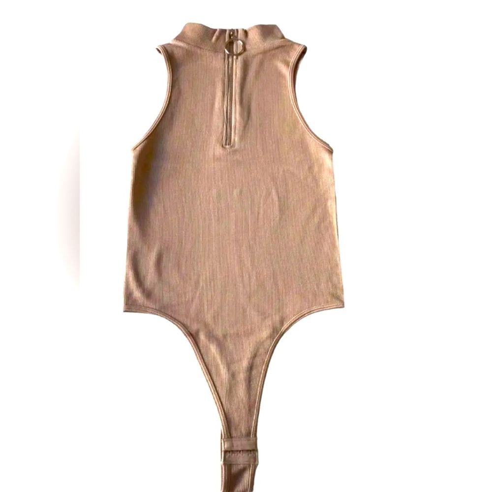 NWOT Dynamic Zip Up Thong Bodysuit.